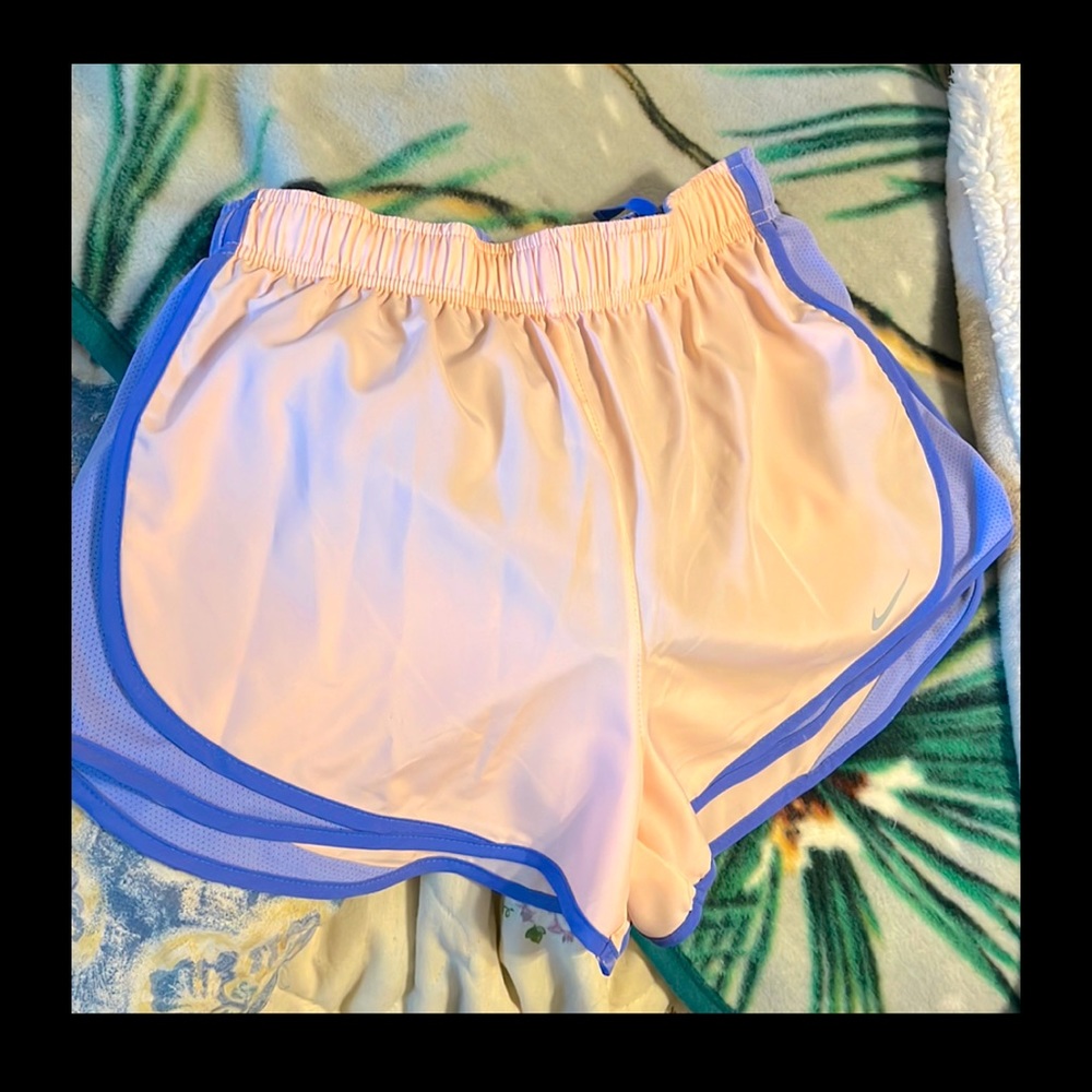 Nike Dri Fit shorts size small. New with tag. Pale pink.